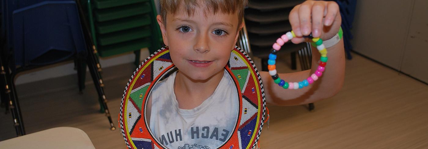 photo of a child participating in a social studies learning lab